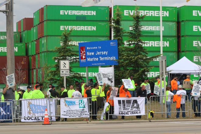 Members of the International Longshoreman's Association strike Tuesday at Port Elizabeth in New Jersey.