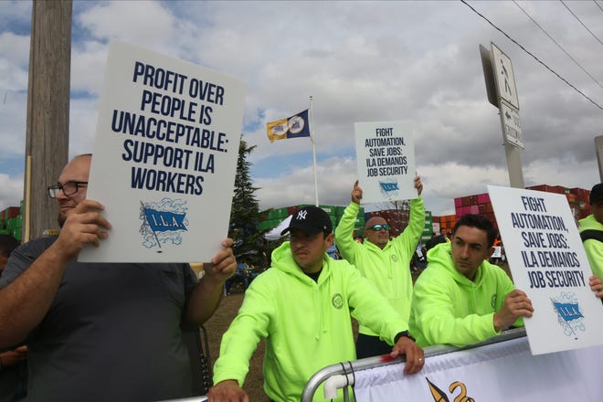 Members of the International Longshoreman's Association strike Tuesday at Port Elizabeth in New Jersey.