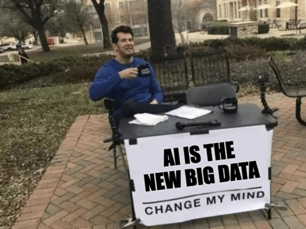 A meme of a man with a sign that says, "AI is the new big data, change my mind"